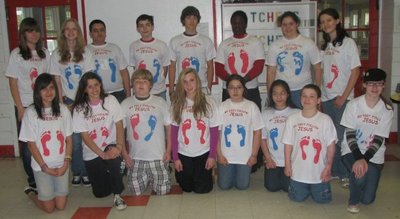 Our Feet Follow Jesus T-Shirt Photo