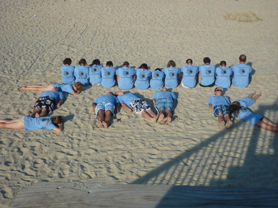 "Inking" It Up On The Beach T-Shirt Photo
