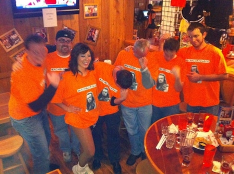 Tebowing At Hooters In Highlander Uniforms T-Shirt Photo