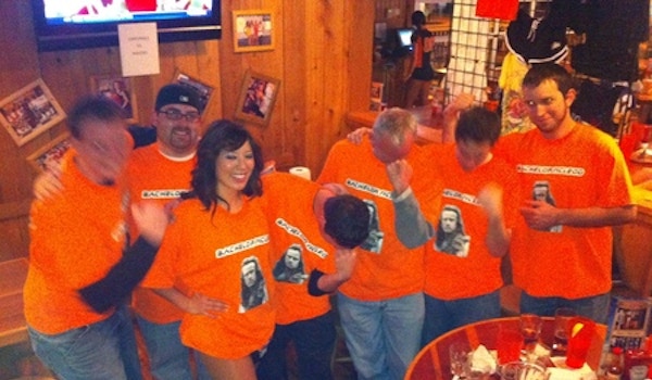 Tebowing At Hooters In Highlander Uniforms T-Shirt Photo
