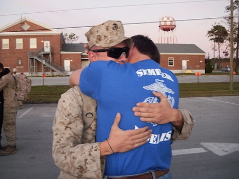 A Father Welcoming His Son Home From The War.  T-Shirt Photo