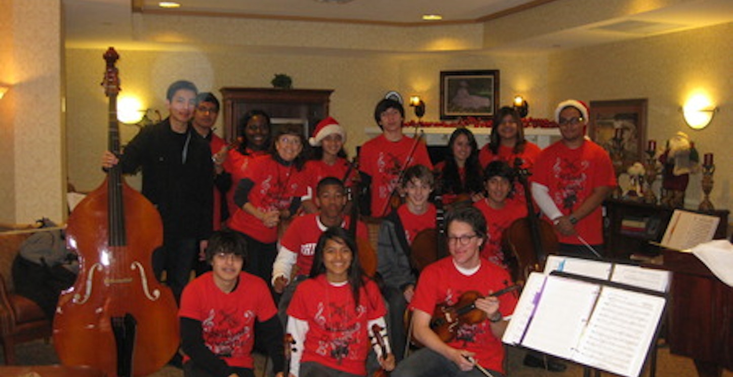Group Pose After Performance At Memory Care Home T-Shirt Photo