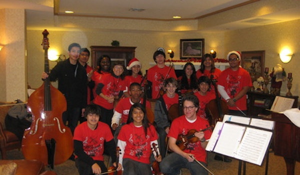 Group Pose After Performance At Memory Care Home T-Shirt Photo