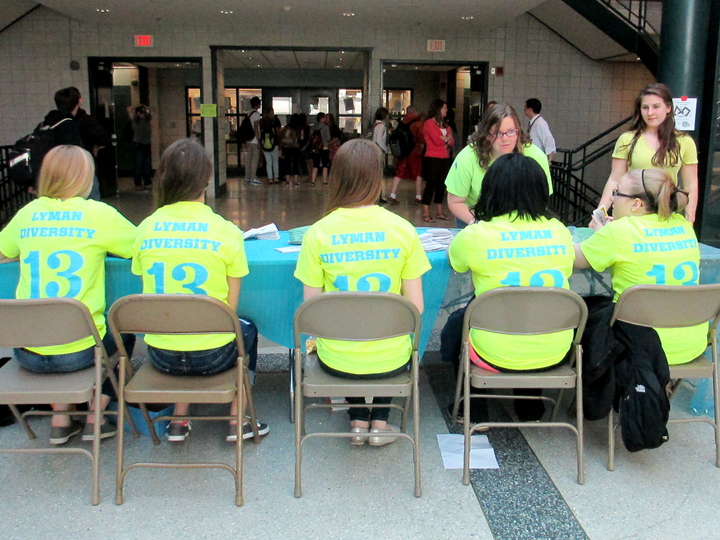 We're In Charge... How Can We Help You? T-Shirt Photo