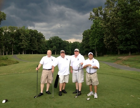 Human Touch   Enjoying Golf On A Blustery Day. T-Shirt Photo