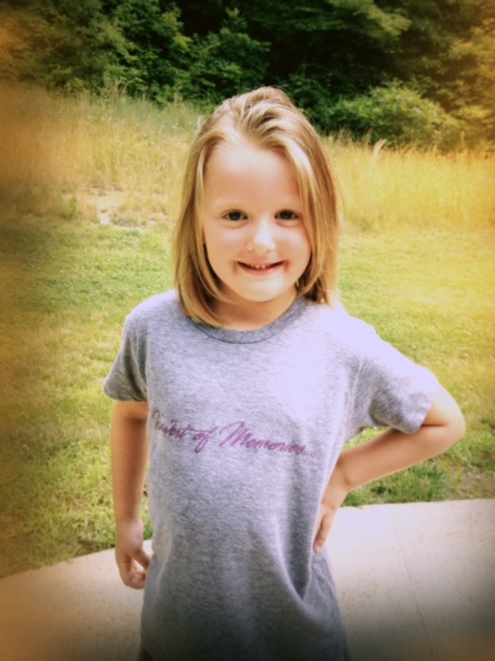 Tiny Advertiser.   T-Shirt Photo