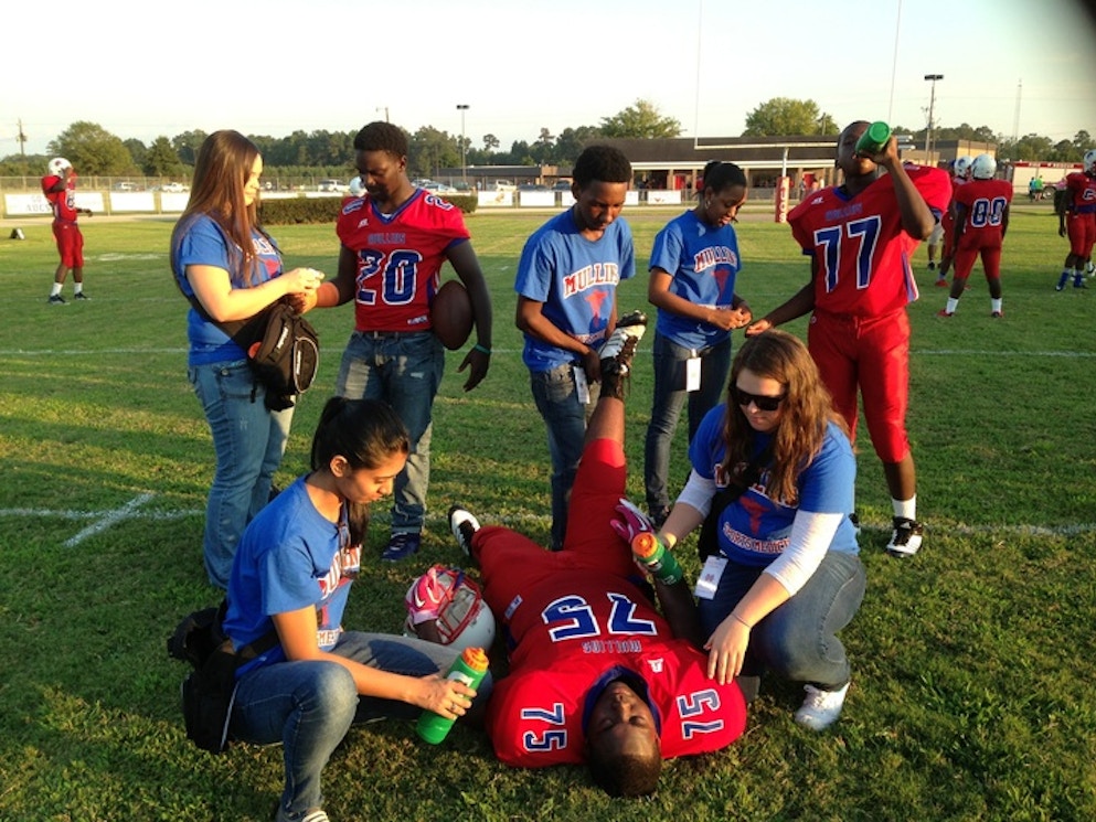 Student Athletic Training Aides Looking Great While Helping The Football Team T-Shirt Photo