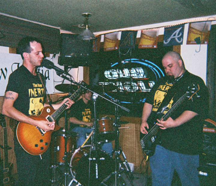 New Inertia  . . . . .  Conquest Tour 2006 T-Shirt Photo