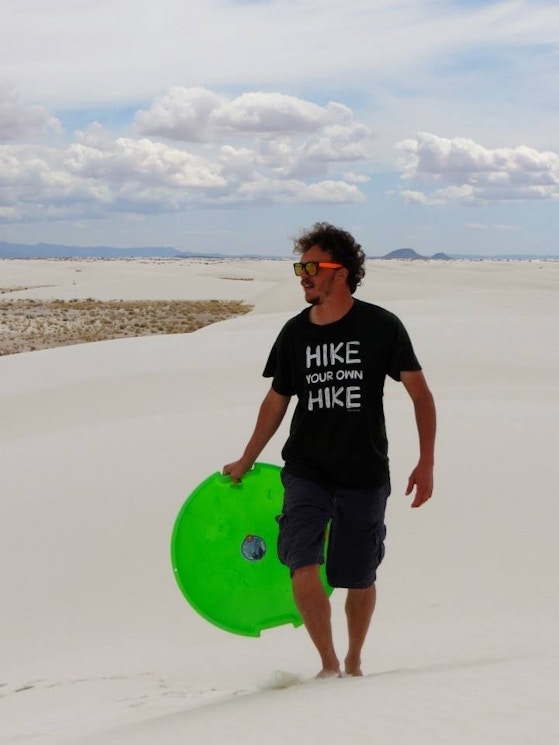 Sledding In White Sands National Monument T-Shirt Photo