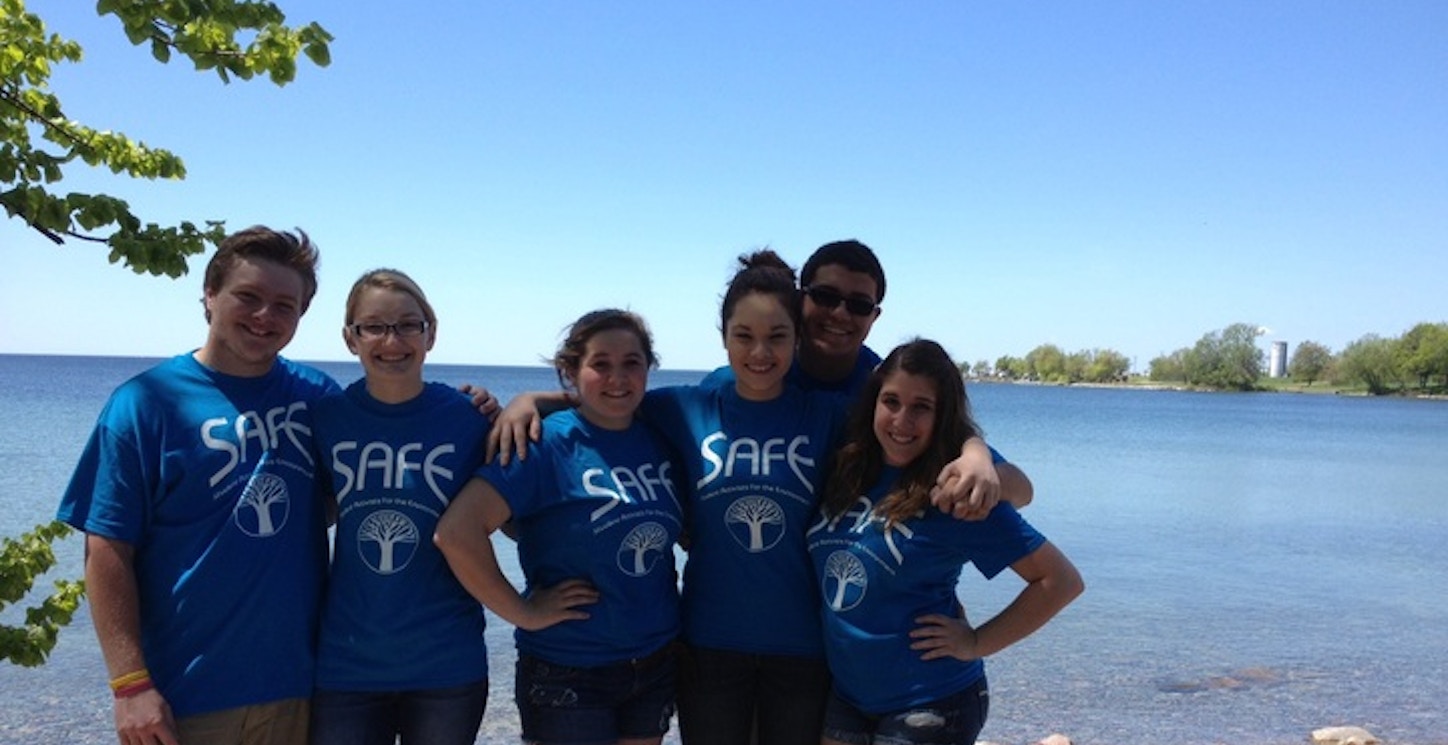 Safe Club Volunteers To Clean Beach T-Shirt Photo