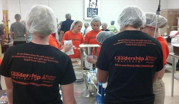 Leading By Serving With Feed My Starving Children T-Shirt Photo