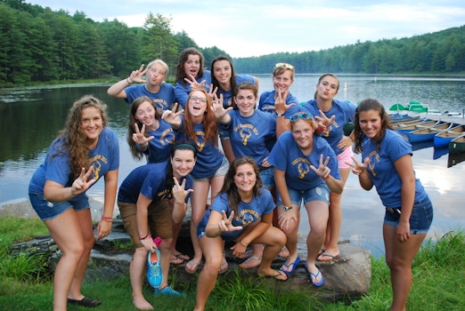 Girls Throwing Up The Young Life Symbol. T-Shirt Photo