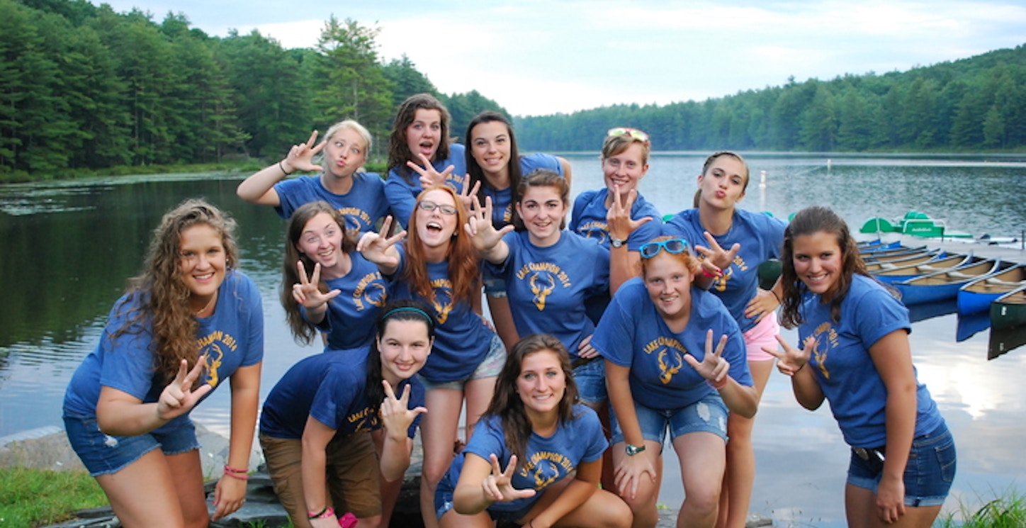Girls Throwing Up The Young Life Symbol. T-Shirt Photo