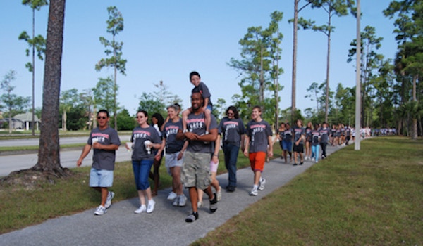 Team Tim From Palm Beach Central Hs Leads The Cf Walk. T-Shirt Photo