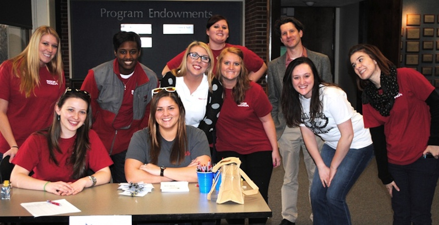 Showing Team Spirit At A Program Event T-Shirt Photo