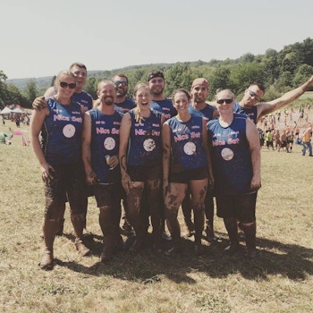 Team Nice Set At The 29th Annual Mud Volleyball Tournament T-Shirt Photo