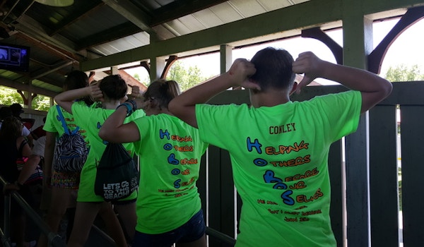 Picture of Showing Off Their Shirts Custom T-Shirt Design Showing Off Their Shirts T-Shirt Photo