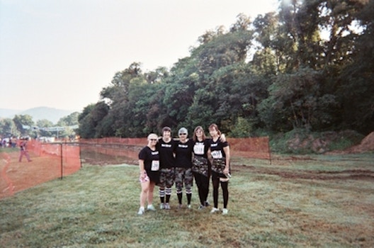 Mud Run Team   Infront Of The Pit T-Shirt Photo