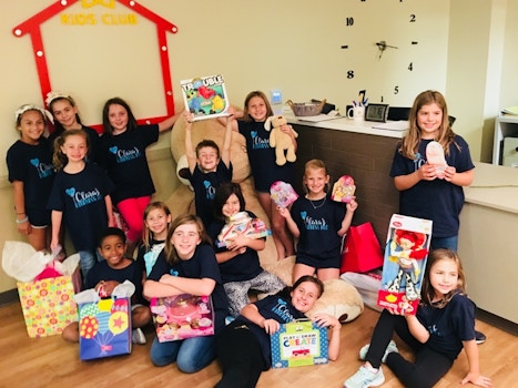 Clara's Kindness Mob Delivering Gifts To The Children's Home T-Shirt Photo