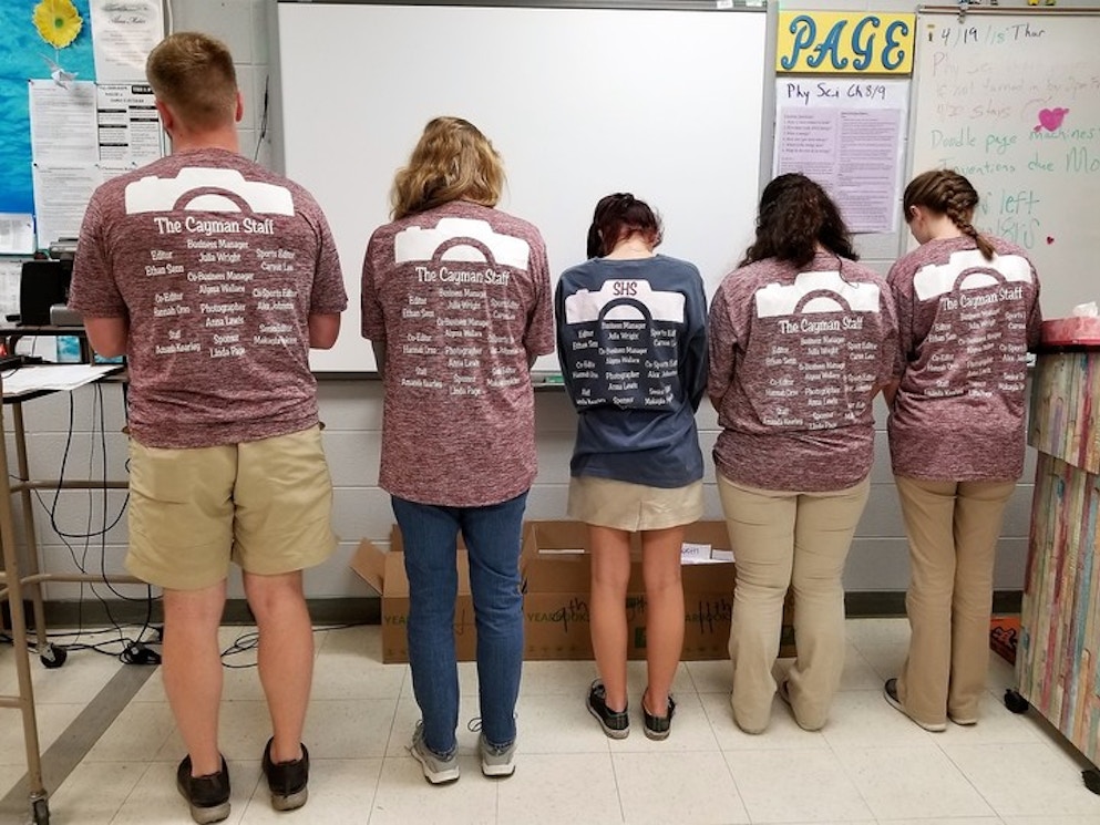 Yearbook Staff Shows Off Their Design T-Shirt Photo