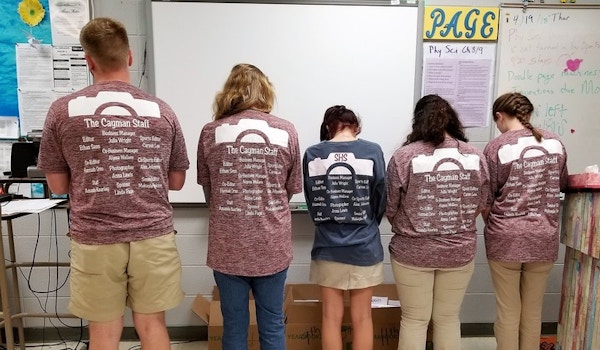 Yearbook Staff Shows Off Their Design T-Shirt Photo